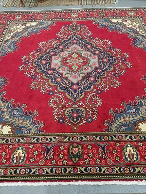 Lot 666 - A Persian carpet of unusual design and size....