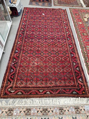 Lot 671 - A Persian tribal rug