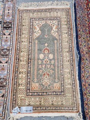 Lot 674 - A Turkish prayer rug