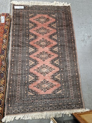 Lot 676 - An Oriental rug of Turkoman design