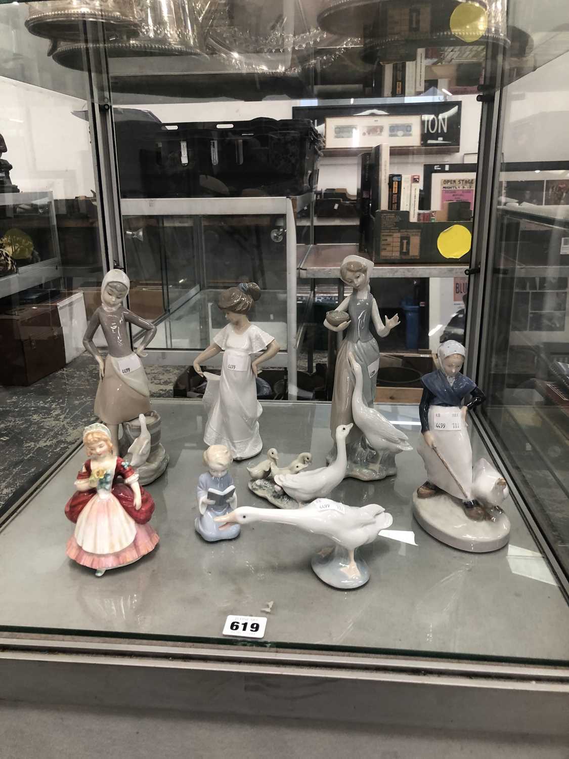 Lot 619 - Eight porcelain figures by Lladro, Copenhagen...