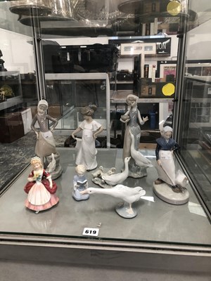 Lot 619 - Eight porcelain figures by Lladro, Copenhagen...