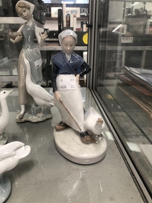 Lot 619 - Eight porcelain figures by Lladro, Copenhagen...
