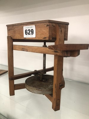 Lot 629 - An apprentice made miniature pottery wheel...
