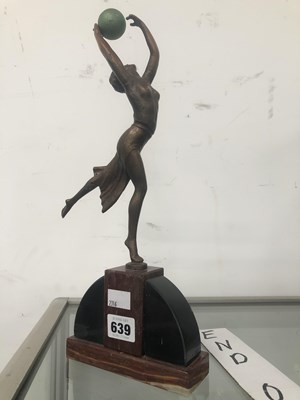 Lot 639 - An Art Deco copper rich figure of a lady...
