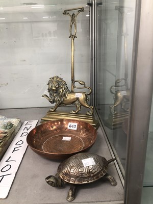 Lot 643 - A brass lion doorstop, a copper bowl and a...