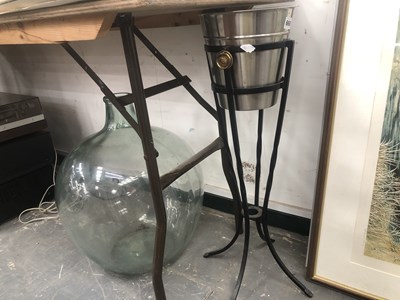 Lot 660 - A champagne bucket and stand together with a...