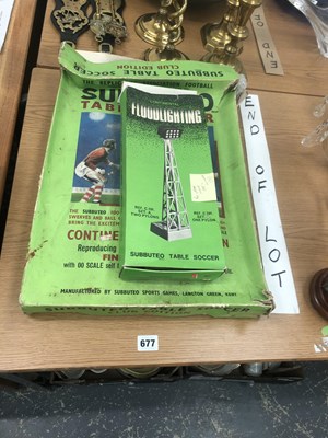 Lot 677 - A boxed Subuteo football set together with a...
