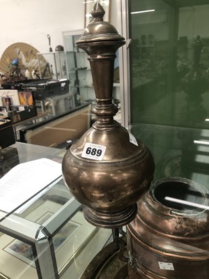 Lot 689 - A middle eastern bronze bottle vase with a...