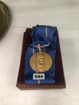 Lot 694 - A leather cased orthodox gilt medallion...
