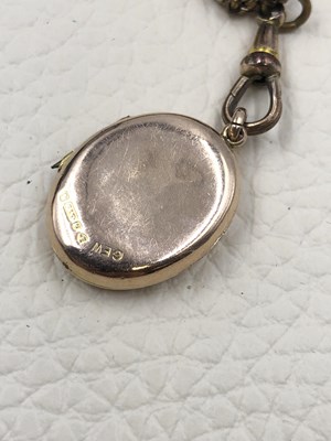 Lot 72 - A 9ct Chester hallmarked oval locket on a...