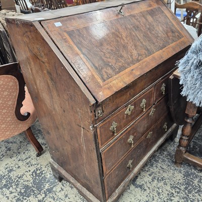 Lot 875 - An 18th-century walnut bureau
