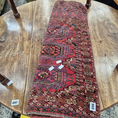 Lot 896 - An antique small eastern rug
