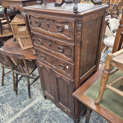 Lot 906 - A French oak small side cabinet.
