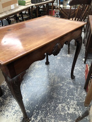 Lot 909 - A Georgian tray top silver table on carved...