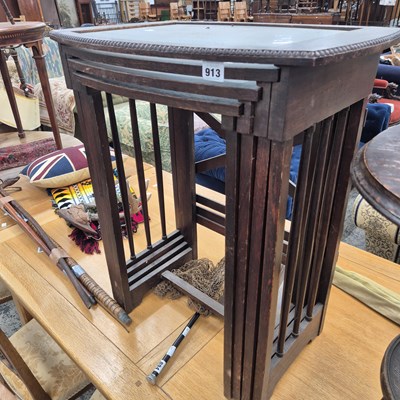 Lot 913 - An antique oak nest of tables.