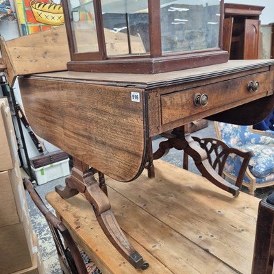 Lot 916 - A regency mahogany sofa table.
