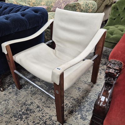 Lot 958 - A retro armchair.