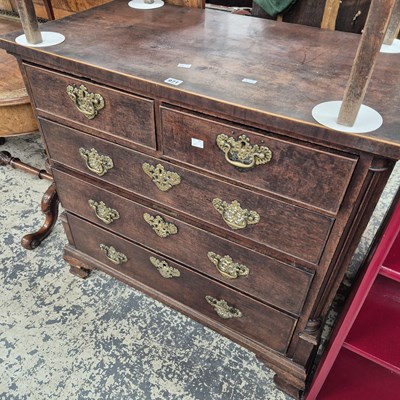 Lot 971 - A Georgian mahogany chest of five drawers.