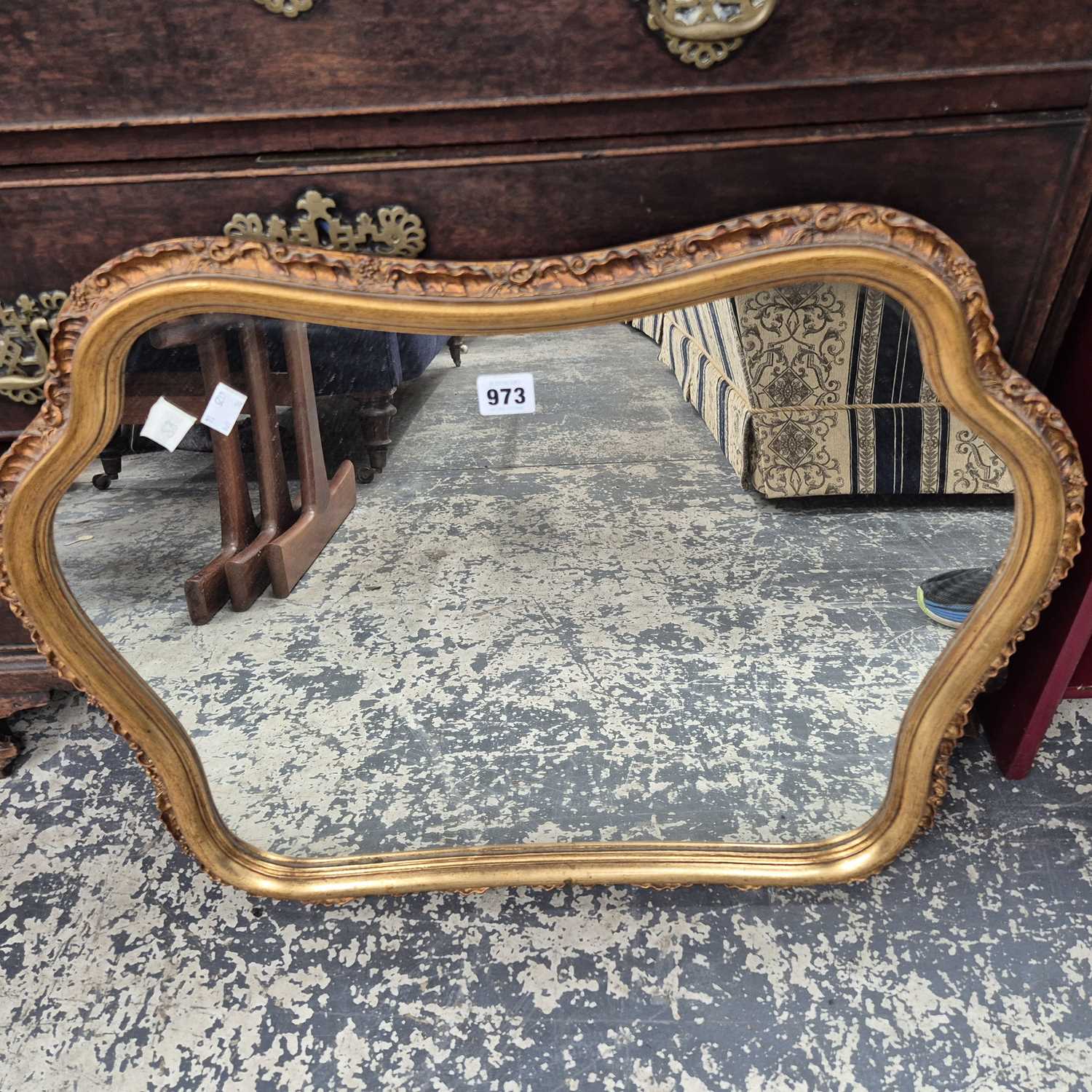 Lot 973 - A gilt framed mirror.