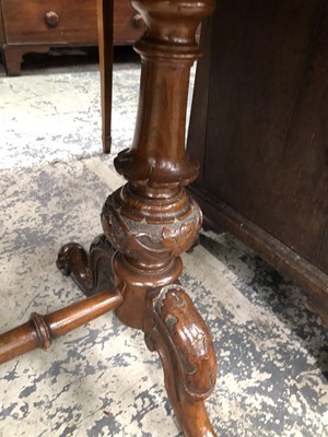 Lot 975 - A Victorian walnut kidney shape writing table...
