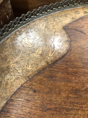 Lot 975 - A Victorian walnut kidney shape writing table...