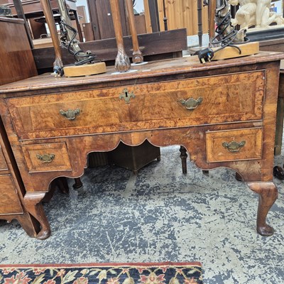 Lot 978 - A Georgian walnut low boy / side table.