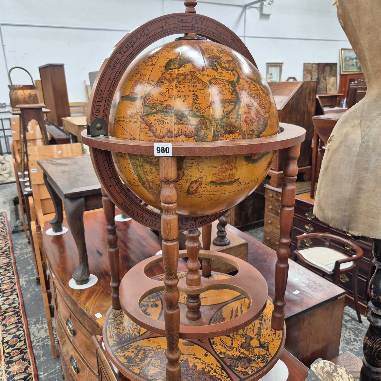 Lot 980 - A Globe form drinks cabinet.