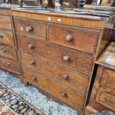 Lot 981 - An early 19th century mahogany chest of drawers.