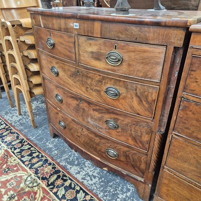 Lot 982 - An antique mahogany bow front chest of five...