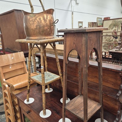 Lot 986 - Two plant stands and a copper scuttle.