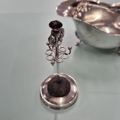 Lot 83 - Hallmarked silver- a sauce boat, four spoons,...