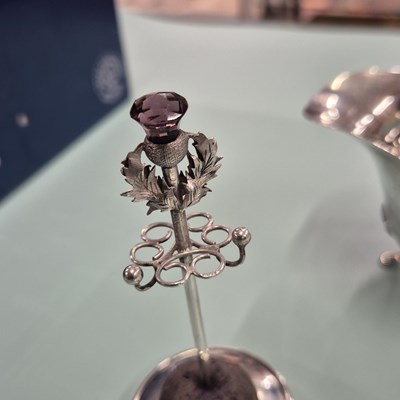 Lot 83 - Hallmarked silver- a sauce boat, four spoons,...