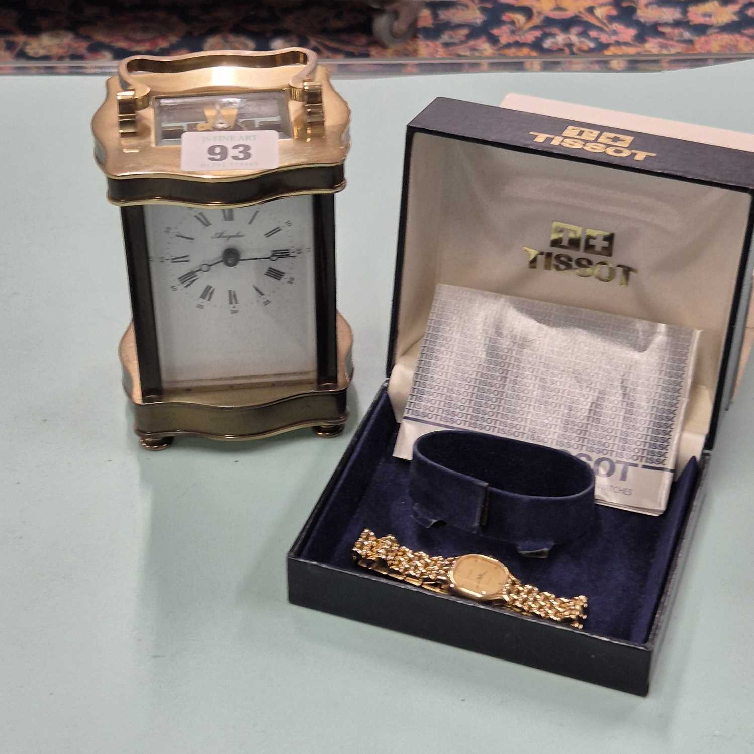 Lot 93 - An Angelus brass carriage clock, complete with...