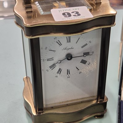Lot 93 - An Angelus brass carriage clock, complete with...