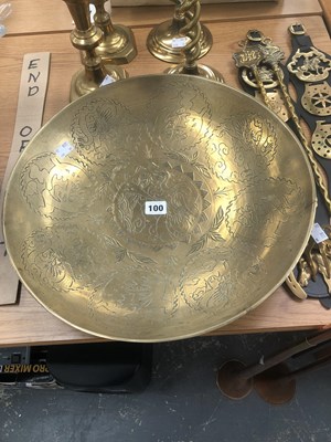 Lot 100 - A large, shallow oriental brass bowl, two...
