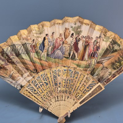 Lot 300 - A lace trimmed fan on mother of pearl sticks...