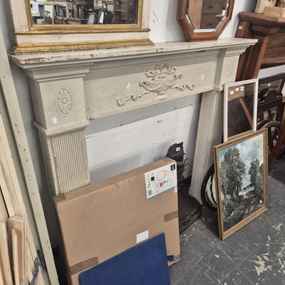 Lot 1107 - A grey painted fire surround with a carved...