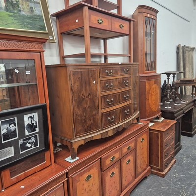 Lot 1118 - A glazed display cabinet on a cupboard base en...