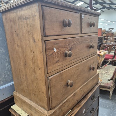 Lot 1120 - A pine chest of two short and two long drawers