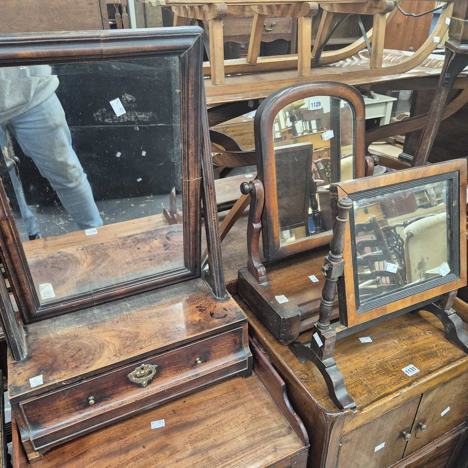 Lot 1129 - A George III mahogany dressing table mirror on...