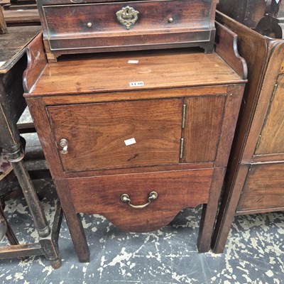 Lot 1130 - A George III mahogany night table with a...