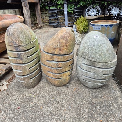 Lot 749 - three lingam stones.