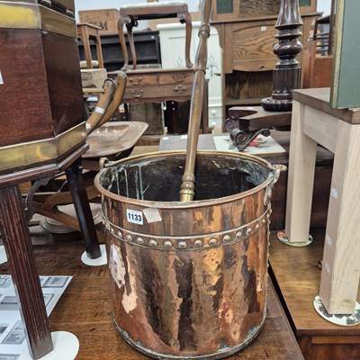 Lot 1133 - A cylindrical copper coal bucket and a warming...
