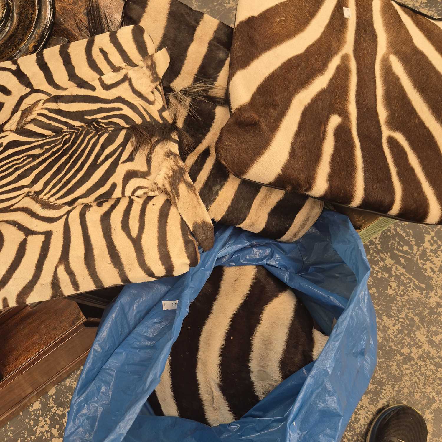 Lot 1142 - Zebra skin cushion covers and cushions