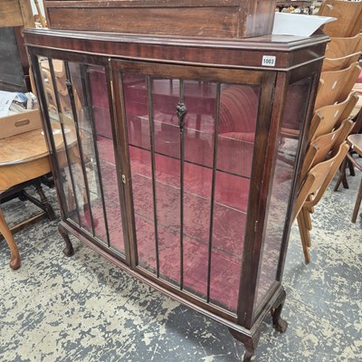 Lot 1003 - A mahogany display cabinet