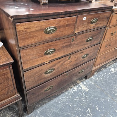 Lot 1011 - An early 19th century chest of five drawers.