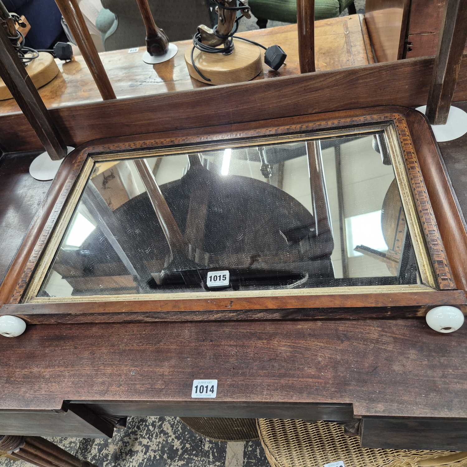 Lot 1015 - A Victorian small overmantle mirror.