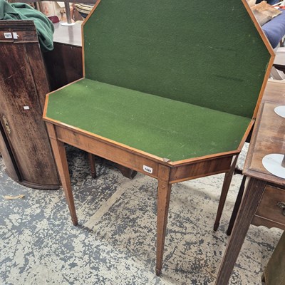 Lot 1020 - A Regency fold over card table.