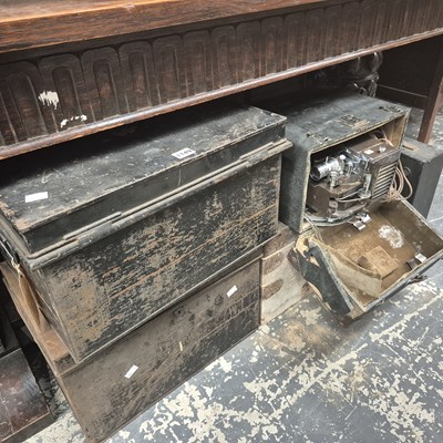 Lot 1149 - A cased film projector, two tin boxes, another...